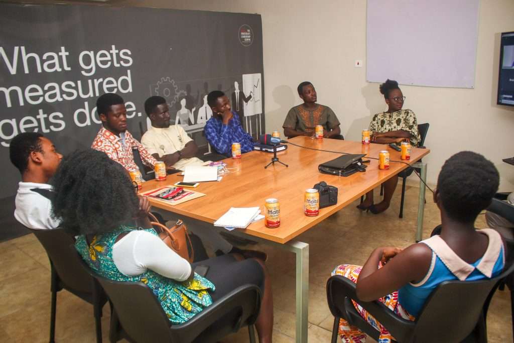 Leaders in a training session around a table